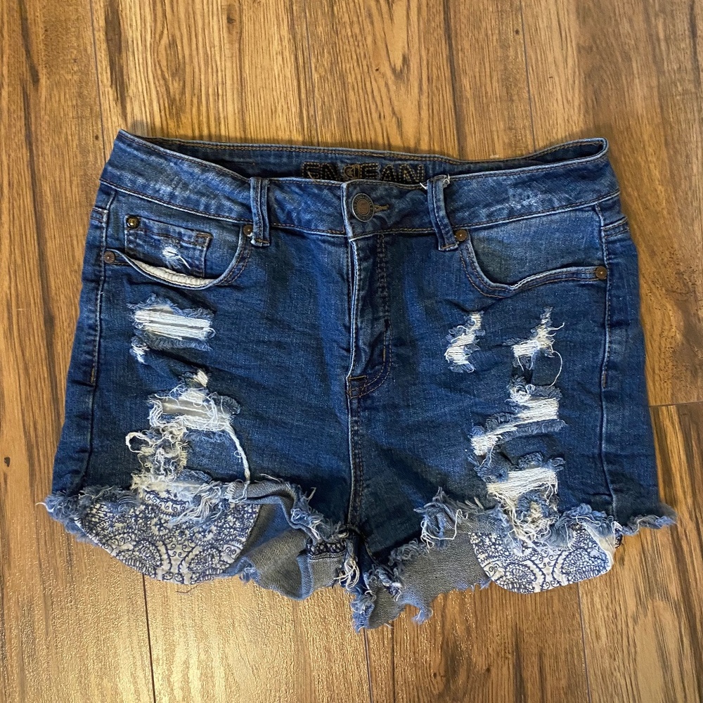 Distressed denim shorts
